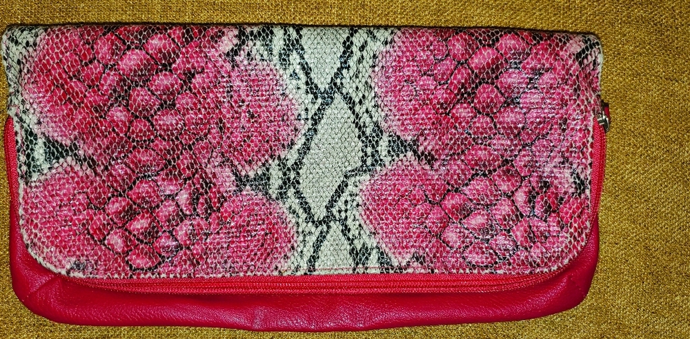 Snakeskin printed clutch
